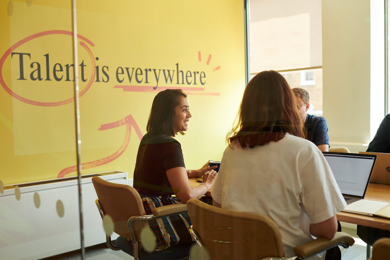 photo of some of the Multiverse team in a meeting